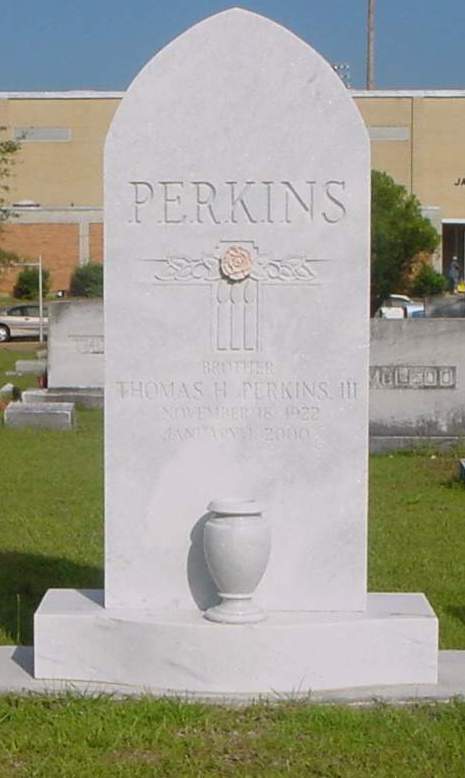 Perkin's monument with carved camellia in Rosehill Cemetary